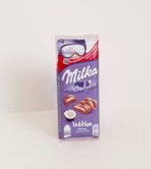 "Milka" кокос пористый молочный шоколад с начинкой